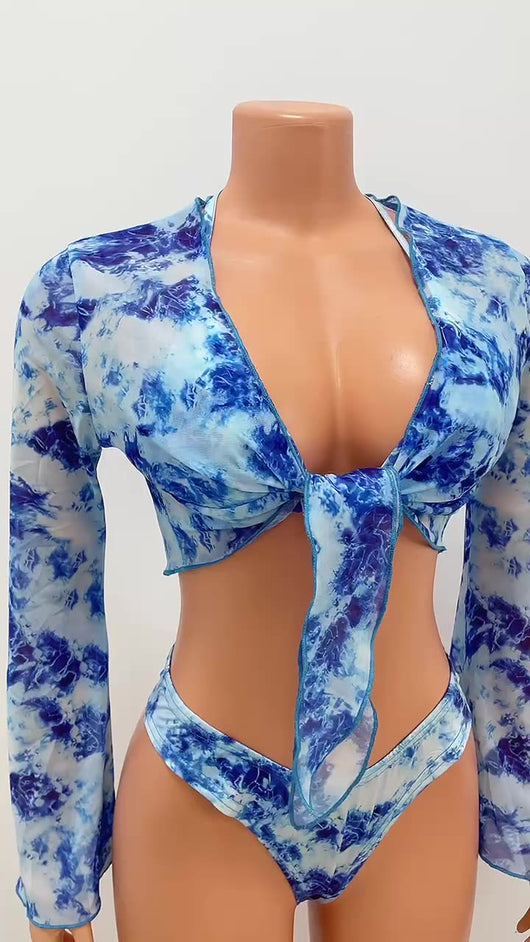 Women's blue tie-dye three-piece bikini set with a halter top, high-cut bottoms, and a long-sleeve mesh cover-up. - Image 10
