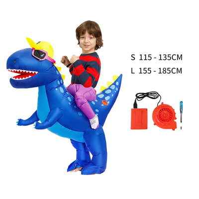 Young boy in an inflatable blue dinosaur costume with a yellow cap and pink goggles, next to a fan and battery pack. - Image 9