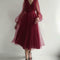 Vestido Largo Ajustado con Escote Profundo y Mangas Puff de Malla