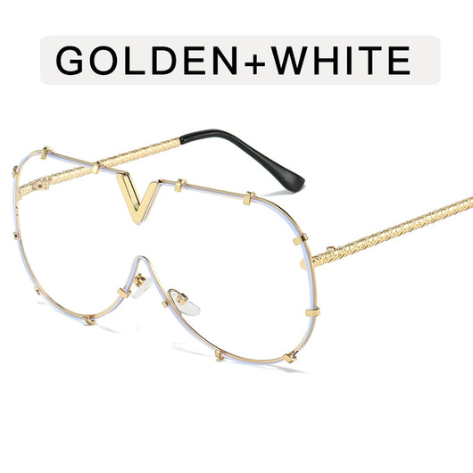 Oversized V-shaped sunglasses with a gold metal frame, white accents, clear lenses, and decorative rivets. - Image 9