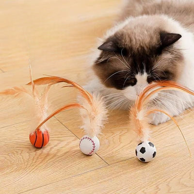 Set of three pet toys: a basketball, baseball, and soccer ball, each with light brown feathers for cats and small dogs. - Image 21