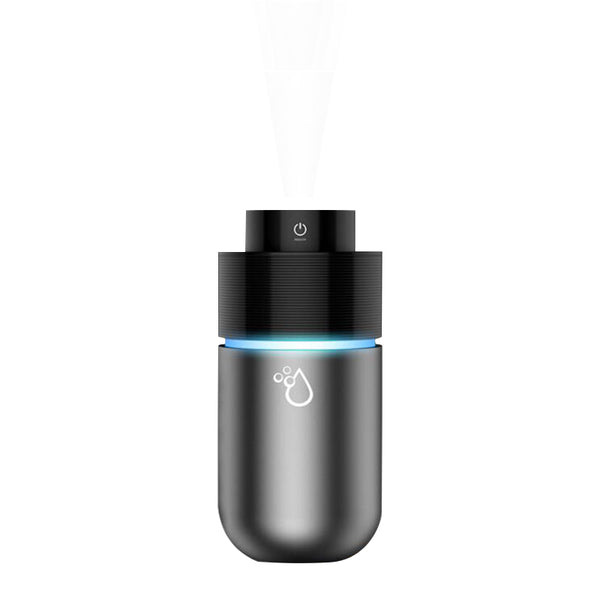 Silver-gray car humidifier and air purifier with a black top, emitting mist and glowing with a blue LED light. - Image 6