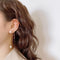Aretes de Estrella con Borla Colgante