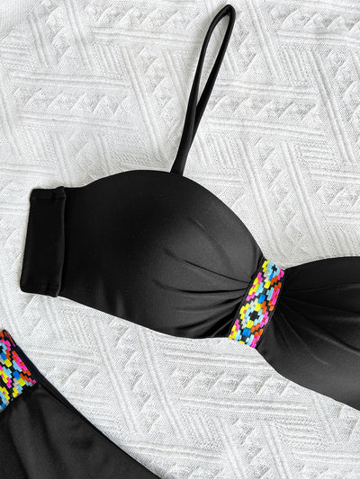 Black split bikini swimsuit for women with a bandeau top and high-cut bottom, featuring colorful geometric patterns. - Image 12