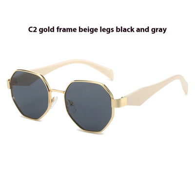 Polygonal sunglasses with a gold metal frame, beige temples, and dark black-gray lenses on a white background. - Image 12