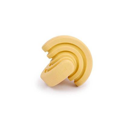 Pink rubber dog molar teeth relief bouncy ball being rinsed with water, showing its textured surface. - Image 14