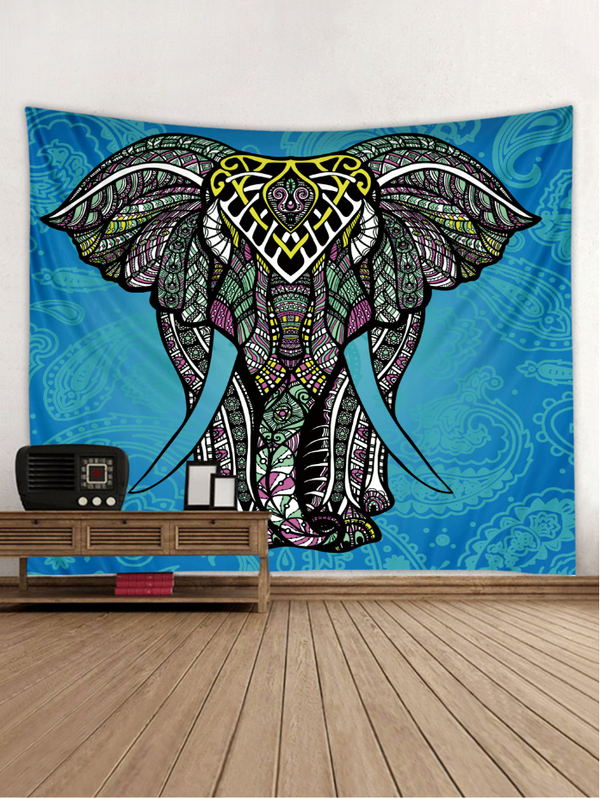 Colorful elephant tapestry with intricate mandala patterns in blue, green, pink, and yellow on a blue paisley background.
