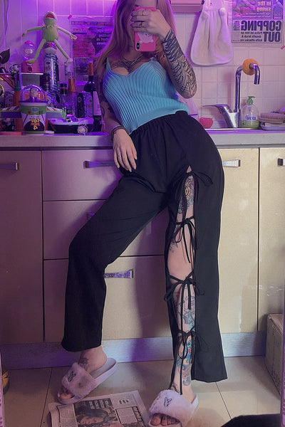 Pantalones rectos con detalles calados