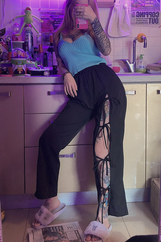 Pantalones rectos con detalles calados