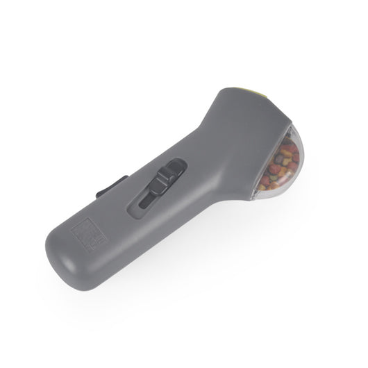 Dog Treat Launcher in retail packaging, a gray handheld device for dispensing snacks during training or playtime. - Image 3