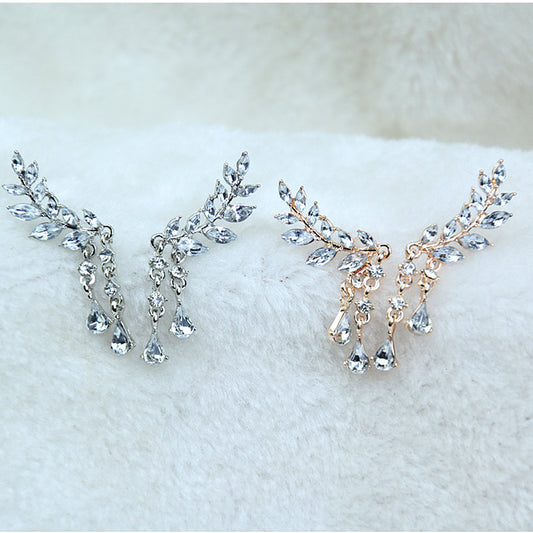 Aretes geométricos con borla larga elegante