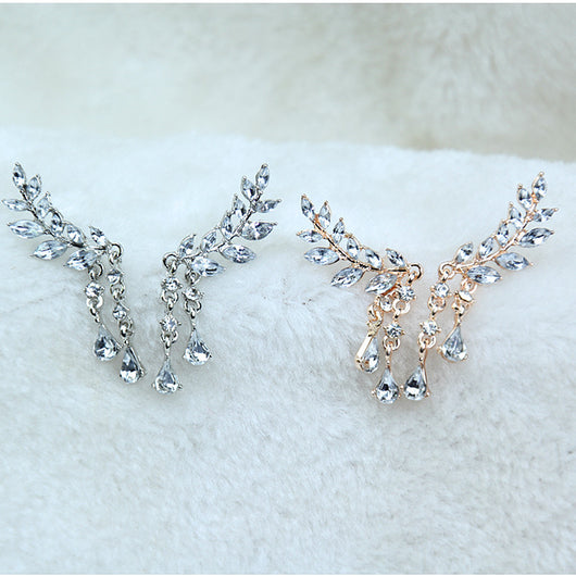 Aretes geométricos con borla larga elegante