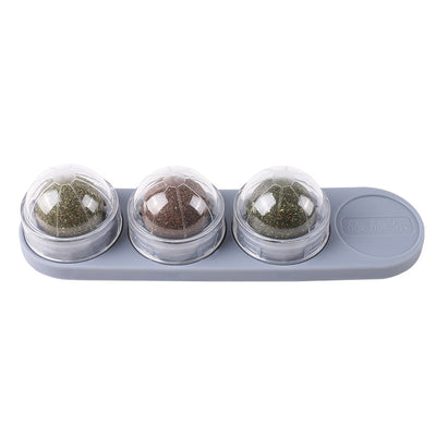 Cat treat dispenser with four lickable balls: cat sugar, cat mint, gall fruit, and silvervine, in a purple holder. - Image 3
