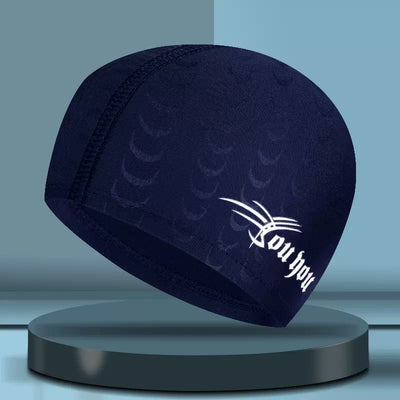 Black cloth swimming cap with a blue tribal-style graphic design on the side. - Image 7