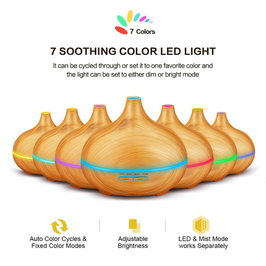 Wood grain ultrasonic aromatherapy diffuser and humidifier with a glowing blue LED light band and control buttons. - Image 3