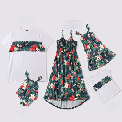 Child's white short-sleeve t-shirt with a horizontal tropical leaf and orange flower print band across the chest. - Image 9
