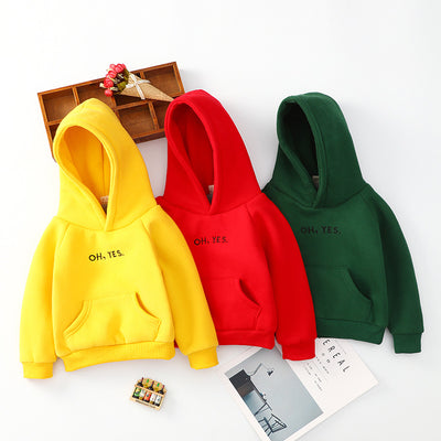 Bright yellow baby hooded sweater with "OH, YES." text, long sleeves, ribbed cuffs, and a kangaroo pocket.
