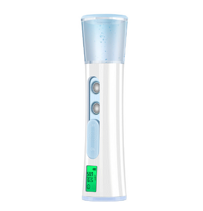 White and rose gold double-spraying nano mist sprayer with a clear reservoir, next to its product box and USB cable. - Image 9