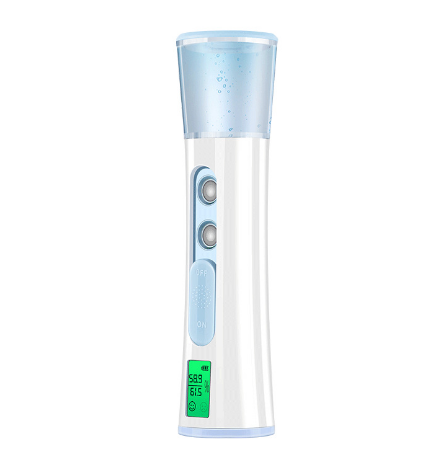 White and rose gold double-spraying nano mist sprayer with a clear reservoir, next to its product box and USB cable. - Image 9