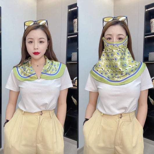 Female cream and black floral polka dot sun protection mask with ear loops, designed for eye corner protection. - Image 51