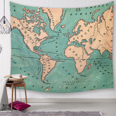 Vintage-style world map tapestry with ocean currents in teal and peach, hanging on a white brick wall. - Image 4
