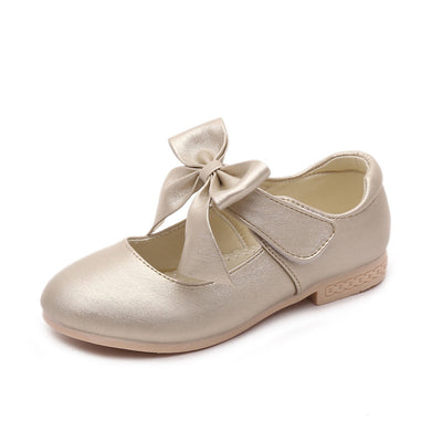 Gold Mary Jane shoes for girls with a large decorative bow on the strap and a low, comfortable heel. - Image 8