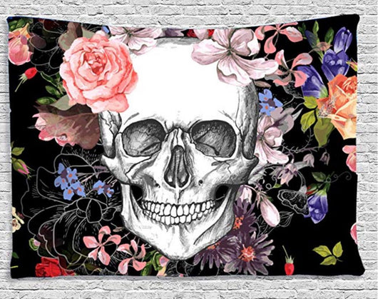 Tapestry featuring a detailed white skull surrounded by vibrant pink, purple, orange, and blue flowers on a black background.