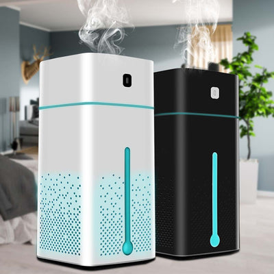 White rectangular home office desktop humidifier with a black power button and water level indicator.