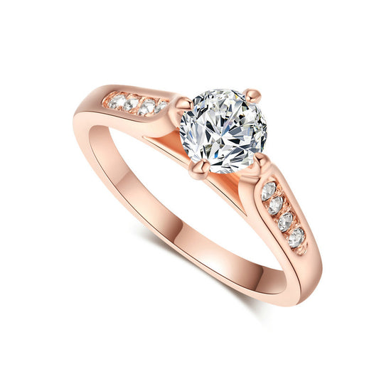 Anillo de Compromiso Minimalista en Oro Rosado con Circonia Cúbica