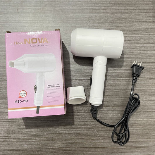 Light blue foldable hair dryer with a cartoon pig design, white power switch, and hanging loop. - Image 9