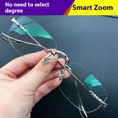 Silver rimless reading glasses with clear lenses held by a hand, featuring decorative temples and smart zoom technology. - Image 4