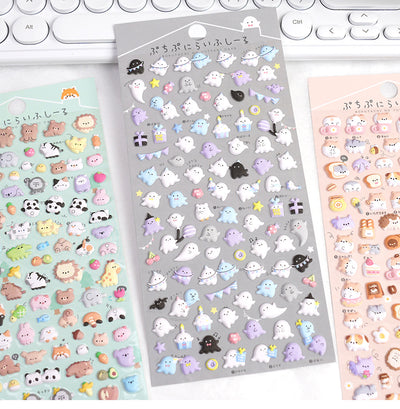 Six sheets of cartoon animal foam particle stickers in various colors and themes, including clouds, food, ghosts, forest animals, and penguins. - Image 8
