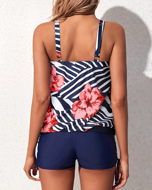 Women's two-piece tankini swimsuit with a colorful abstract print tank top and solid black ruched swim shorts. - Image 23