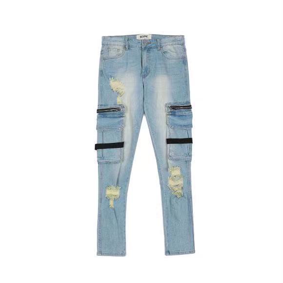 Jeans Rotos con Cierres y Detalles Desgastados