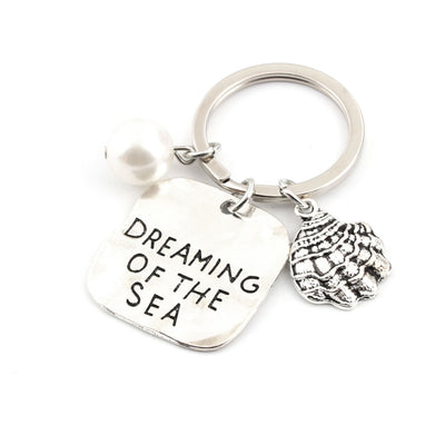 Llavero Personalizado Perla Marina - Accesorio Metálico de Verano