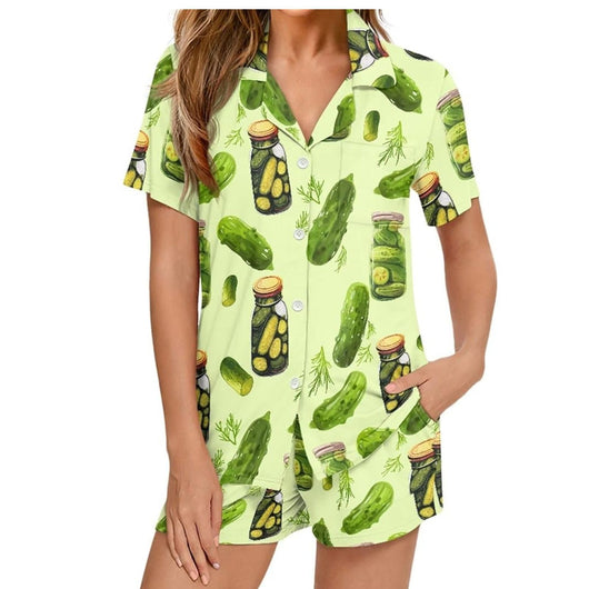 White short-sleeve pajama set with red and green Christmas tree and star print, featuring green piping. - Image 13
