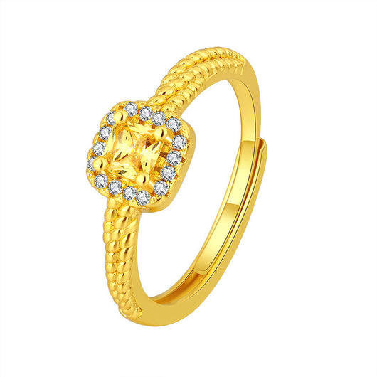 Women's gold-toned jewelry set with a ring, necklace, and stud earrings, each featuring a square yellow gemstone surrounded by small clear stones. - Image 6