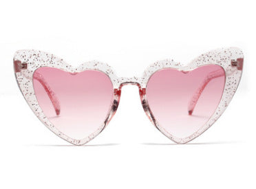 Heart-shaped tortoiseshell sunglasses with light brown lenses on a white background, perfect for women. - Image 5
