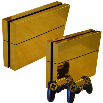 Metallic green PS4 console housing film and two matching PS4 controllers with a glossy finish.