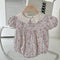 Enterizo Floral para Bebé con Cuello Muñeca y Mangas Abullonadas