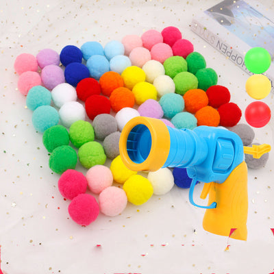 Colorful pompom balls and a yellow and blue toy launcher, a fun set for cats or kids. - Image 8
