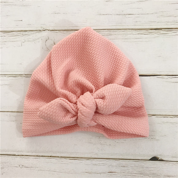 Gorro para bebé con moño