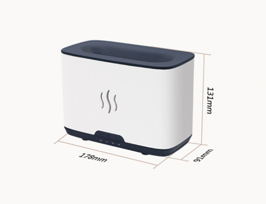 Dark gray rectangular aromatherapy humidifier with an orange flame-like mist and three essential oil bottles. - Image 8