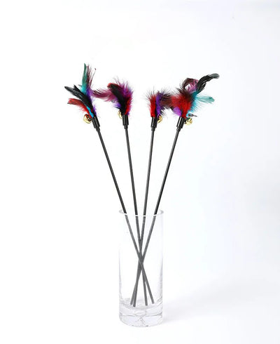Three cat teaser wands with black sticks, colorful feathers in purple, red, and teal, and small gold bells. - Image 13