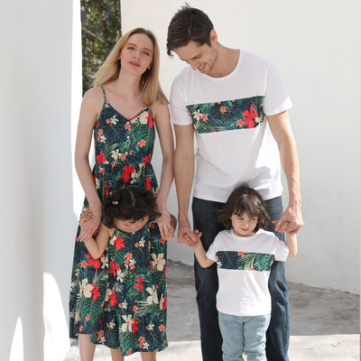 Child's white short-sleeve t-shirt with a horizontal tropical leaf and orange flower print band across the chest. - Image 5