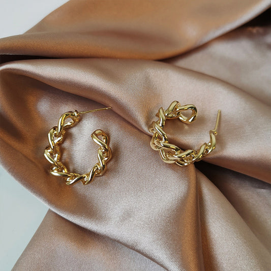Aretes de Metal Pesado
