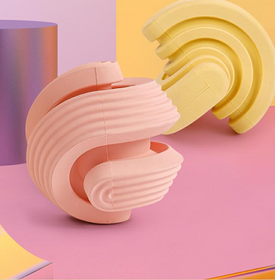 Pink rubber dog molar teeth relief bouncy ball being rinsed with water, showing its textured surface. - Image 8