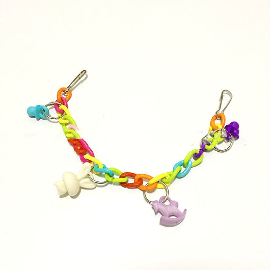 Colorful acrylic chain suspension bridge swing toy with hanging charms for parrots, installed in a white bird cage. - Image 4