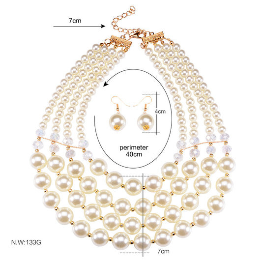 Multi-strand faux pearl and crystal necklace with matching drop earrings on a black jewelry bust. - Image 2
