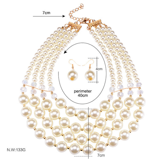 Multi-strand faux pearl and crystal necklace with matching drop earrings on a black jewelry bust. - Image 2